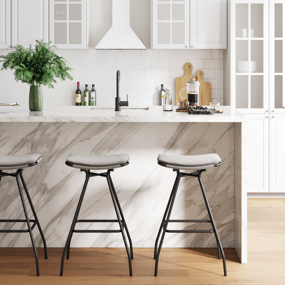 Nathan James Dominique Industrial Backless Kitchen Bar Stool with Brown Leather Saddle Seat and Metal Base