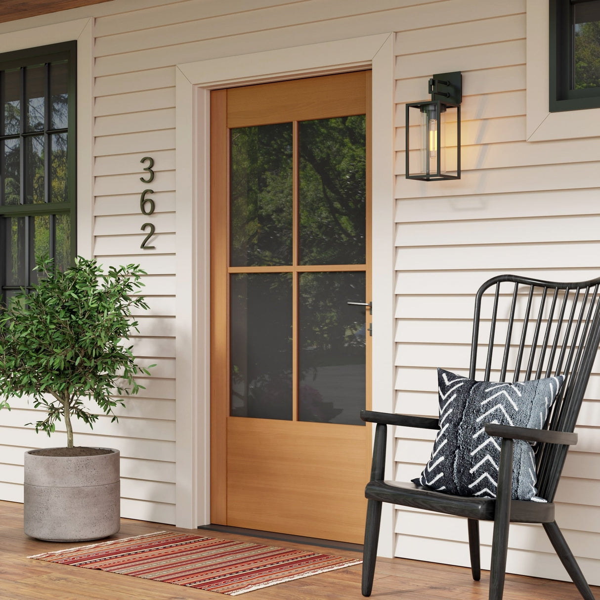 Nathan James Sedona Outdoor Black Wall Sconce Porch Lantern with Open Iron Frame and Cylinder Glass Shade