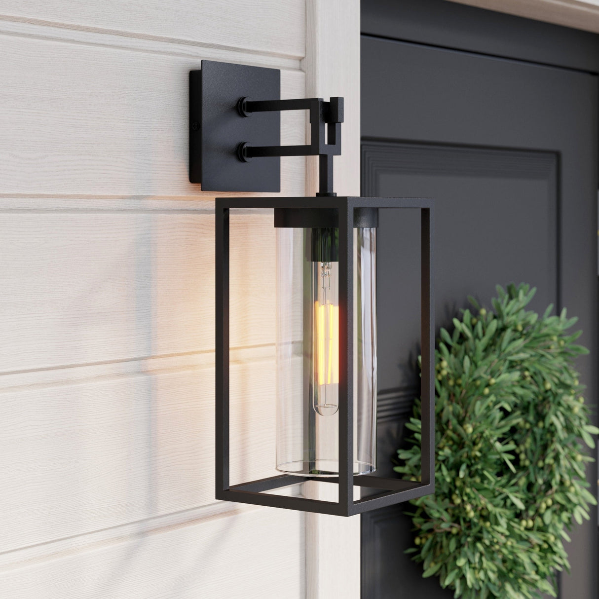 Nathan James Sedona Outdoor Black Wall Sconce Porch Lantern with Open Iron Frame and Cylinder Glass Shade