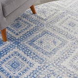Nourison Whimsicle Boho Distressed Tribal Ivory Blue Area Rug