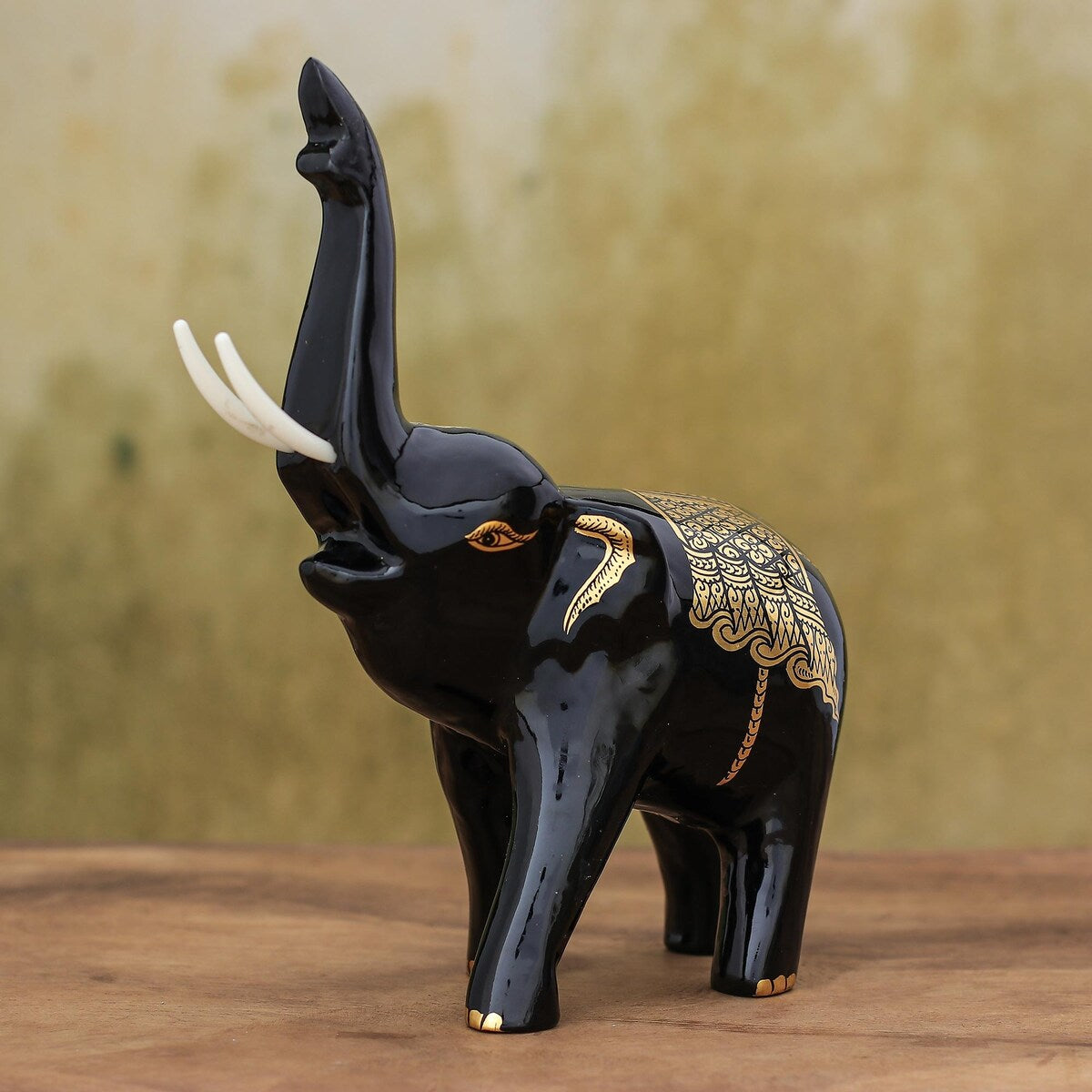 Novica Handmade Treasured Trumpeter Gold-Accented Wood Sculpture
