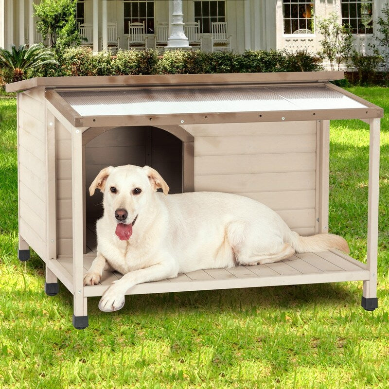Outdoor fir wood dog house with an open roof for medium to large dogs. Dog house with large terrace