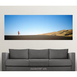 Rear view of a woman running in the desert, Great Sand Dunes National Monument, Colorado - Multi