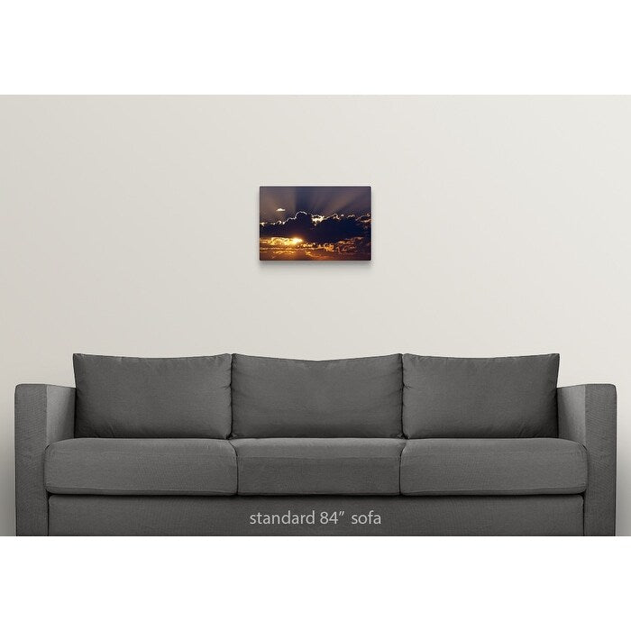 "Sun rising behind dark clouds, Montana" Canvas Wall Art