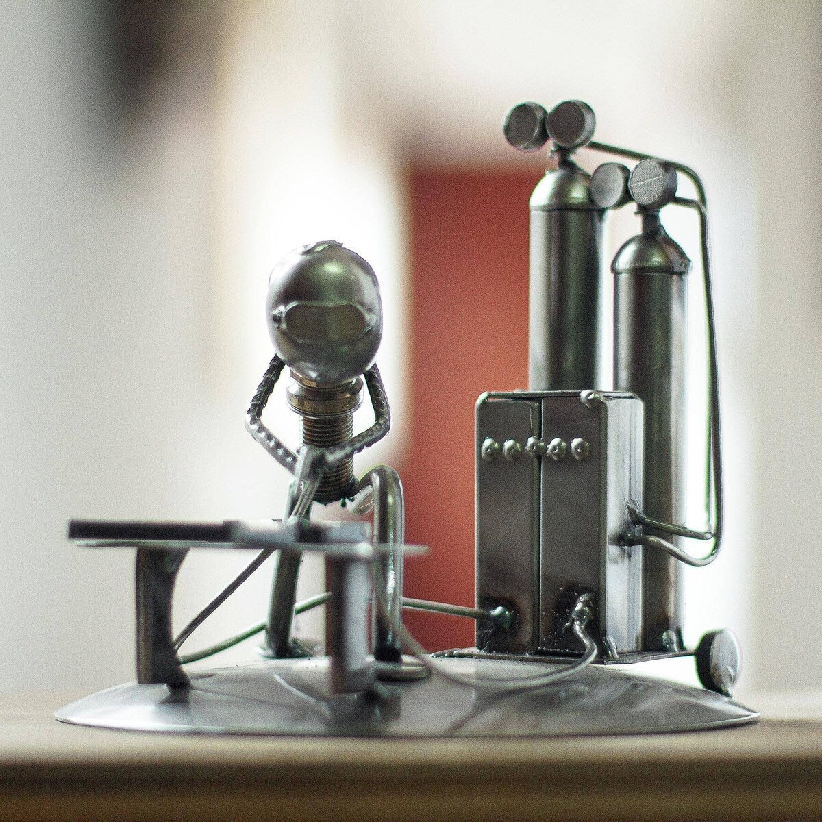 Recycled auto parts sculpture, 'Rustic Welder'