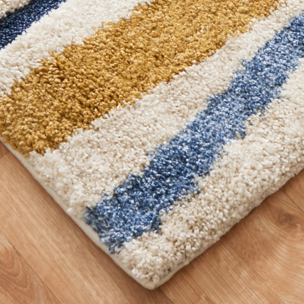 Carson Carrington Holstebro Blue/Gold Wavy Stripe Shag Area Rug