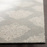 SAFAVIEH Handmade Abstract Niang Modern Wool Rug