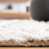 SAFAVIEH Handmade Kenya Eefje Wool Tassel Rug