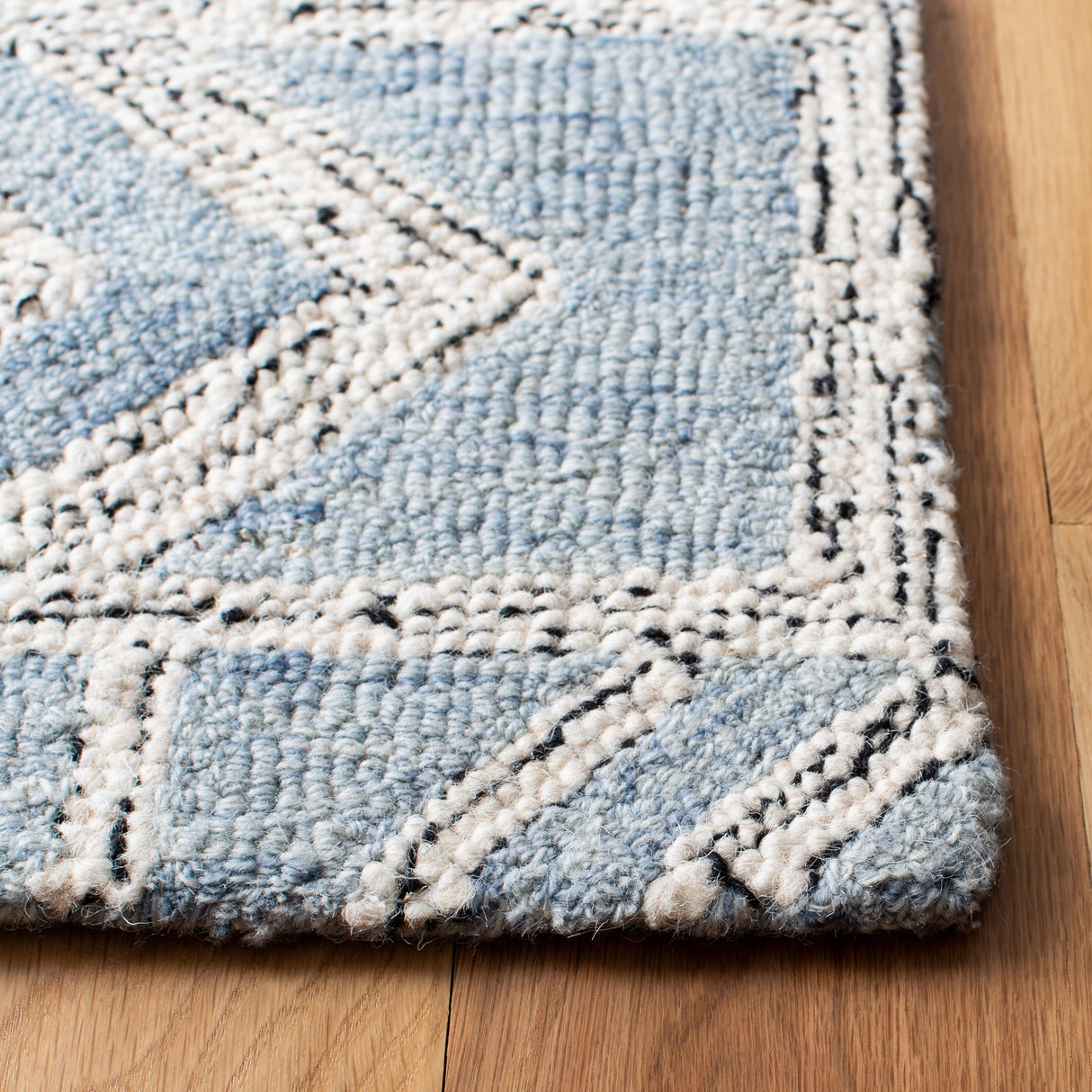 SAFAVIEH Handmade Micro-Loop Oprea Modern Wool Rug