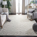SAFAVIEH Handmade Micro-Loop Tomke Wool Rug
