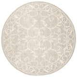 SAFAVIEH Handmade Micro-Loop Tomke Wool Rug