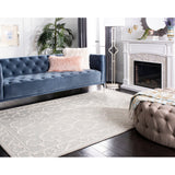 SAFAVIEH Handmade Micro-Loop Tomke Wool Rug
