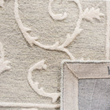 SAFAVIEH Handmade Micro-Loop Tomke Wool Rug