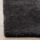 SAFAVIEH Handmade Sheep Shag Dochia Solid Polyester Rug