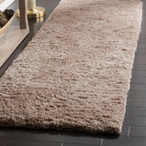SAFAVIEH Handmade Sheep Shag Dochia Solid Polyester Rug