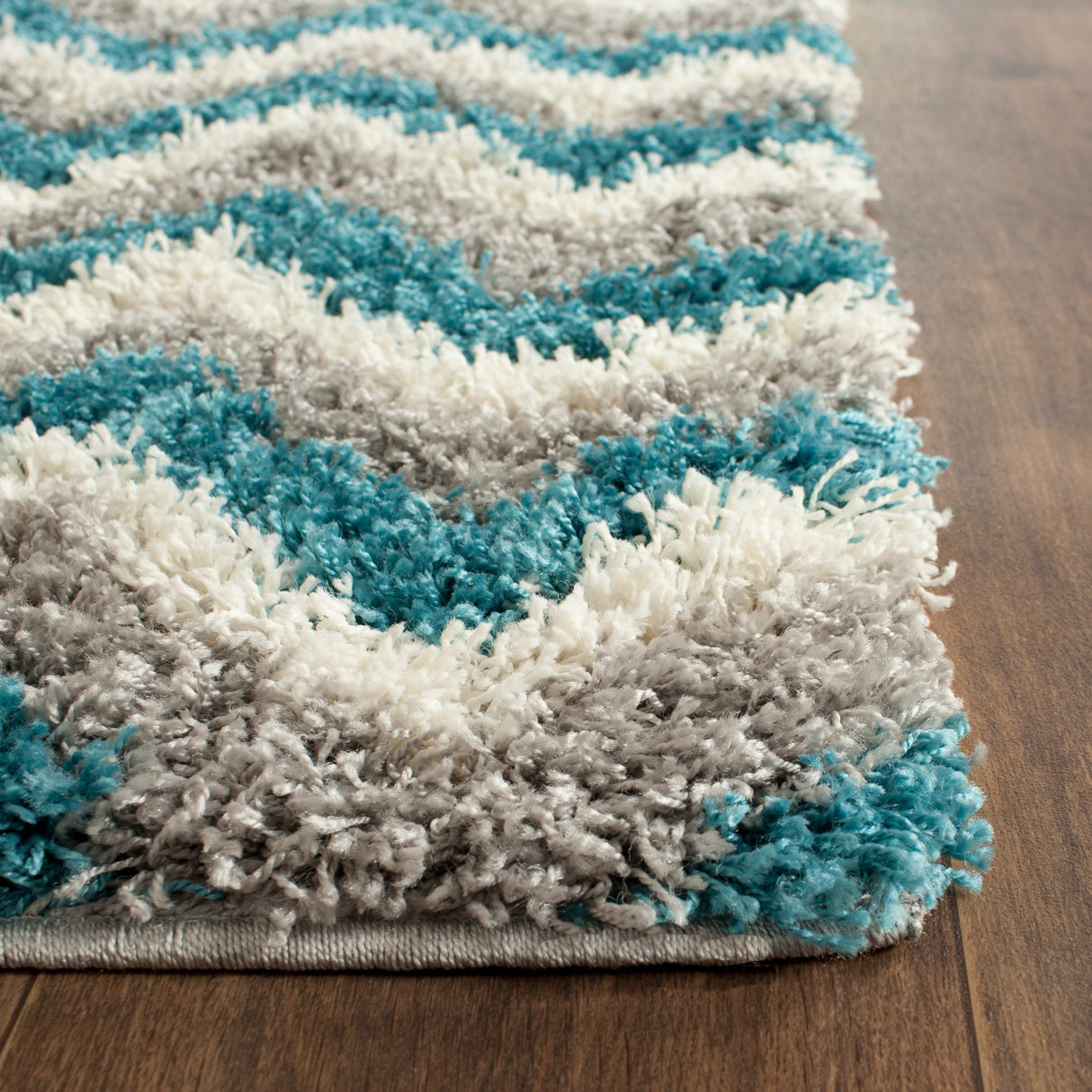 SAFAVIEH Kids Shag Nikki Nursery Playroom 2-inch Thick Rug