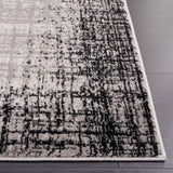 SAFAVIEH Skyler Paralee Modern Abstract Border Rug