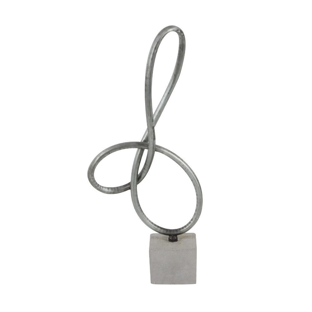 Silver Metal Sculpture On Cement Base