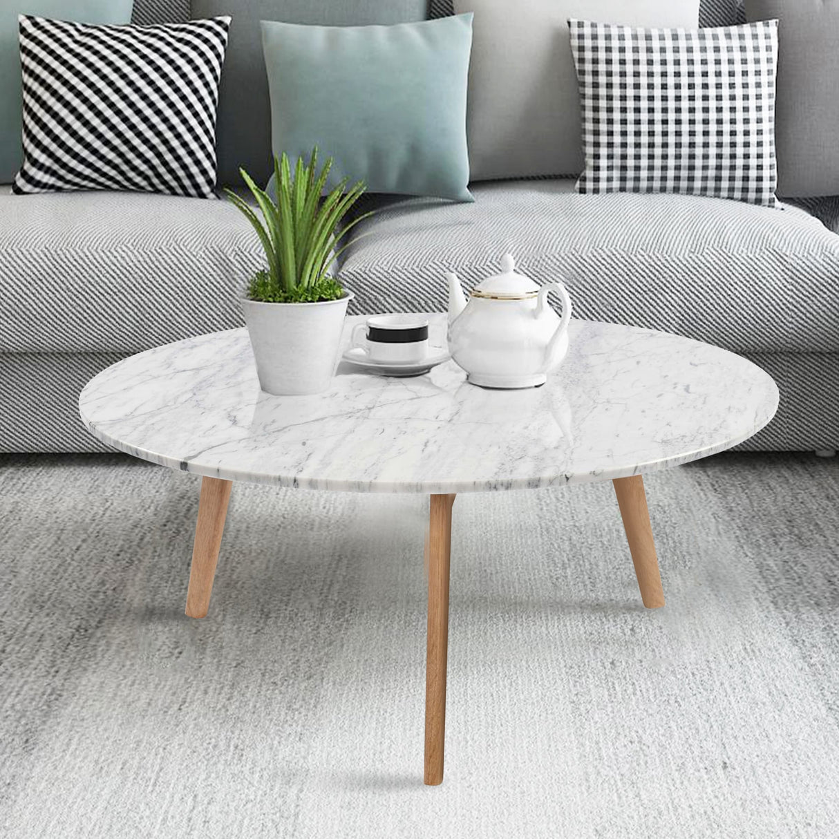 Carson Carrington Tangeberg 31-inch Round Marble Coffee Table with Oak Legs