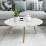 Carson Carrington Tangeberg 31-inch Round Marble Coffee Table with Oak Legs