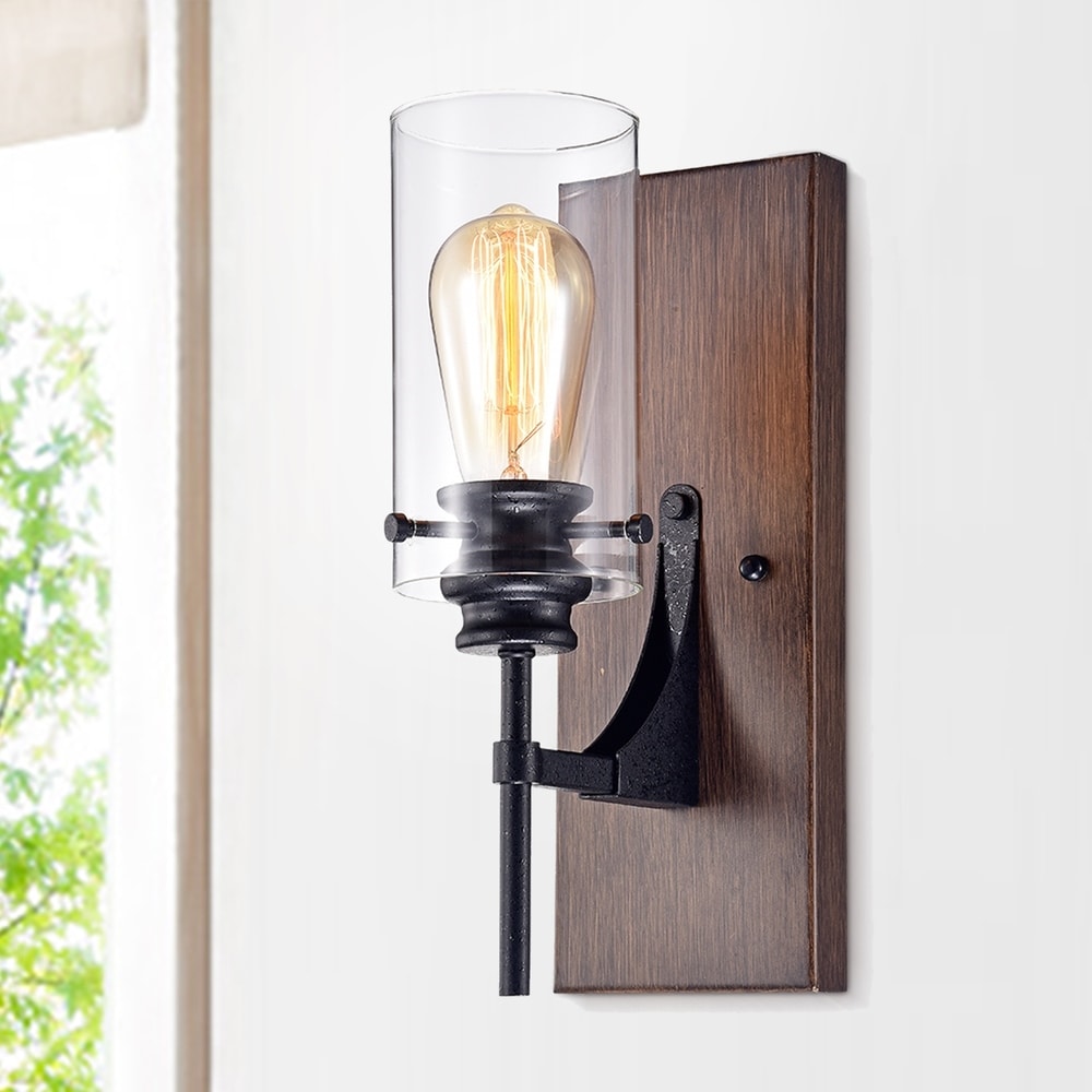 Stravo 1-light Black and Faux Wood Finish Metal Wall Sconce with Glass Cylinder Shade (includes Edison Bulb)