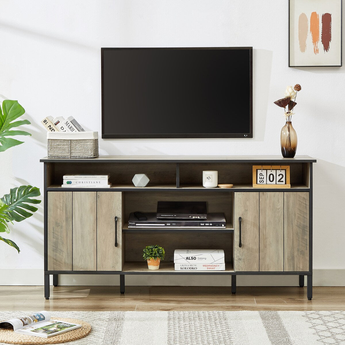 TV stand and media entertainment center console with open shelving and two storage cabinets