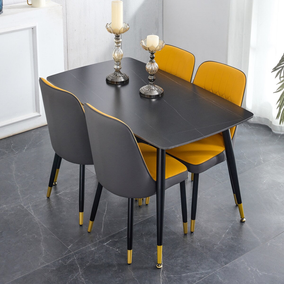 Table and chair set. Black sintered stone tabletop with black metal legs
