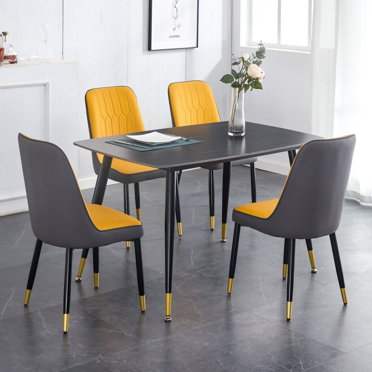 Table and chair set. Black sintered stone tabletop with black metal legs