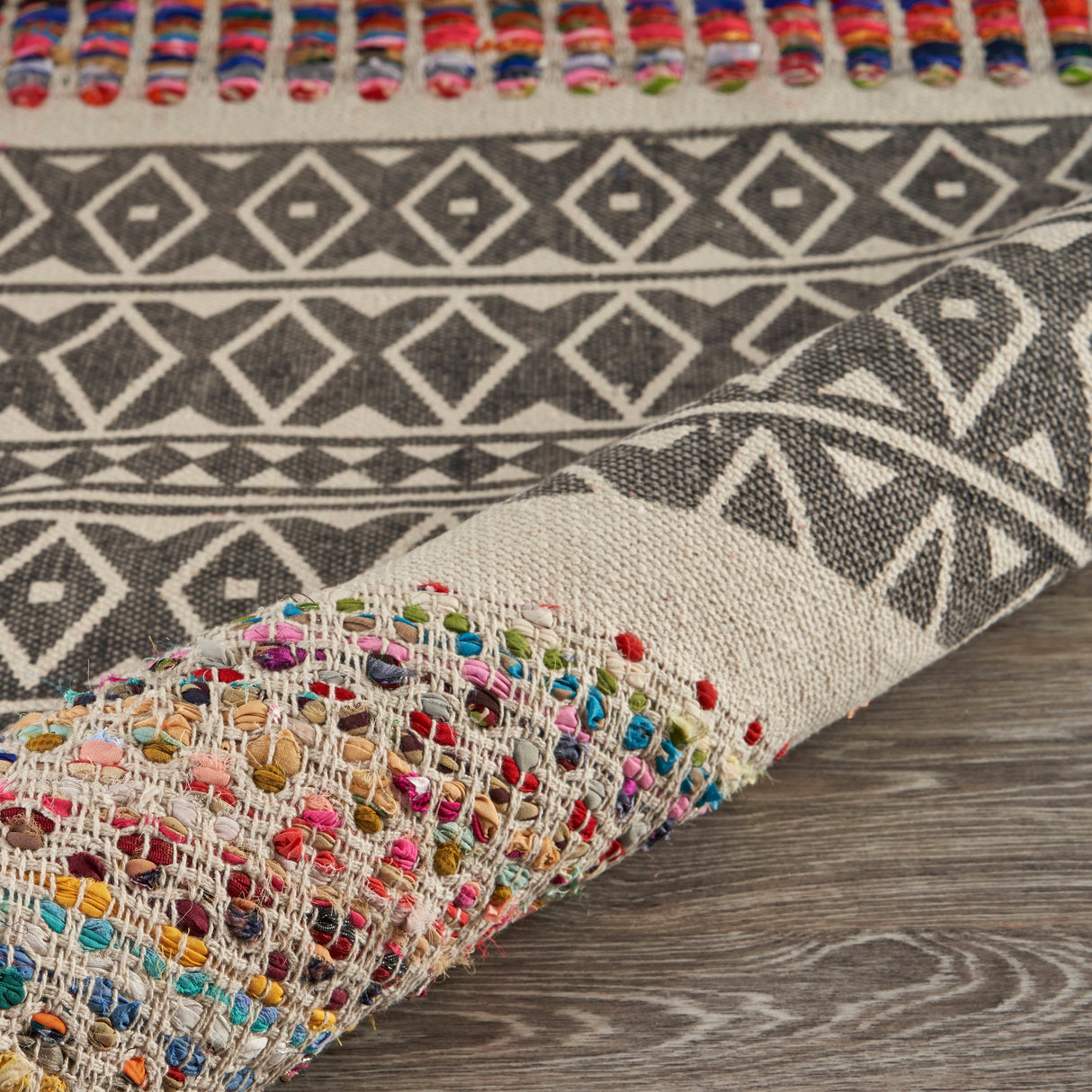 Sevita Geometric Chindi Area Rug
