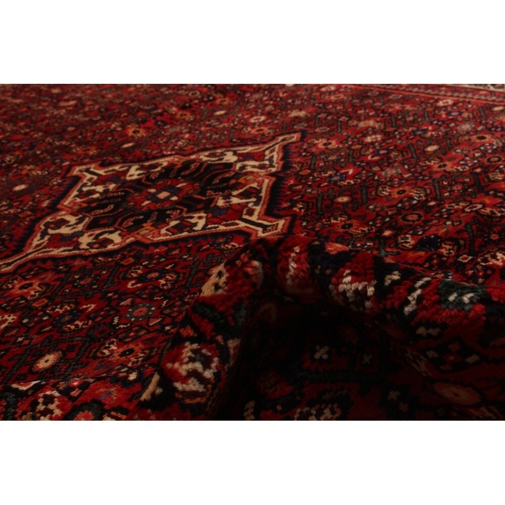 Hand-knotted Hosseinabad Copper Wool Rug - 6'10" x 10'0"