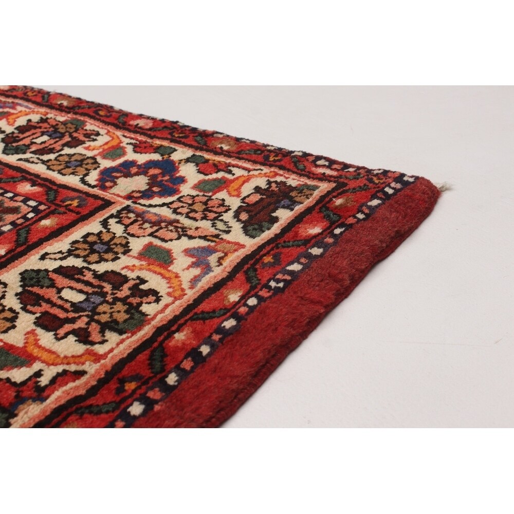 Hand-knotted Hosseinabad Copper Wool Rug - 6'10" x 10'0"